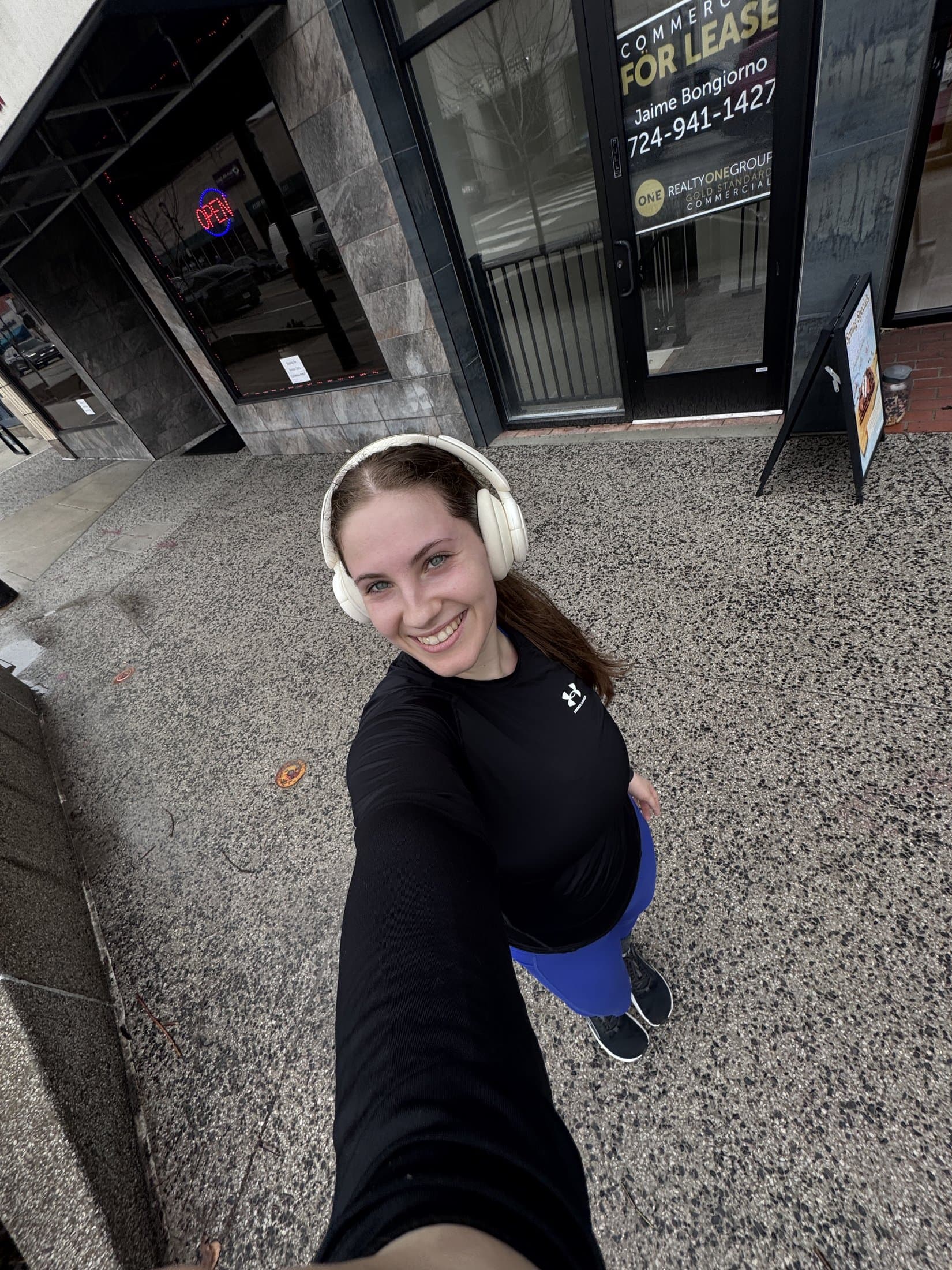 Jea smiling on an everyday walk outside, building easy movement habits